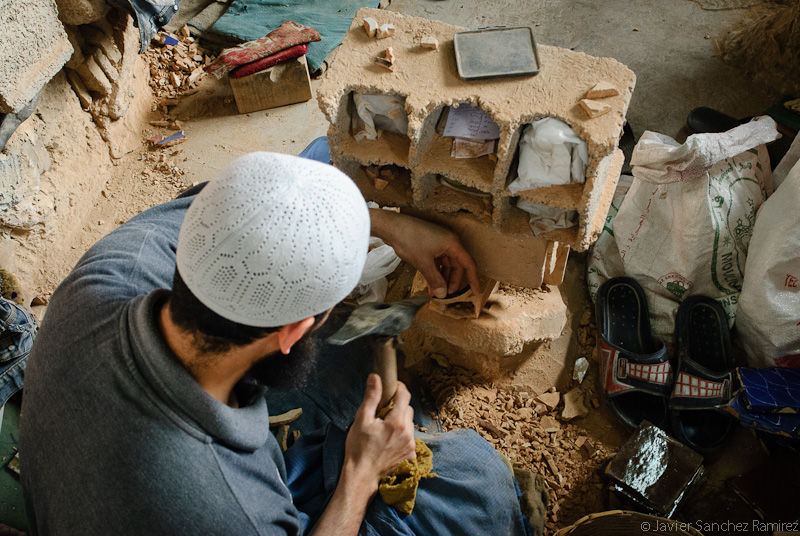 arabic man working in fez medina